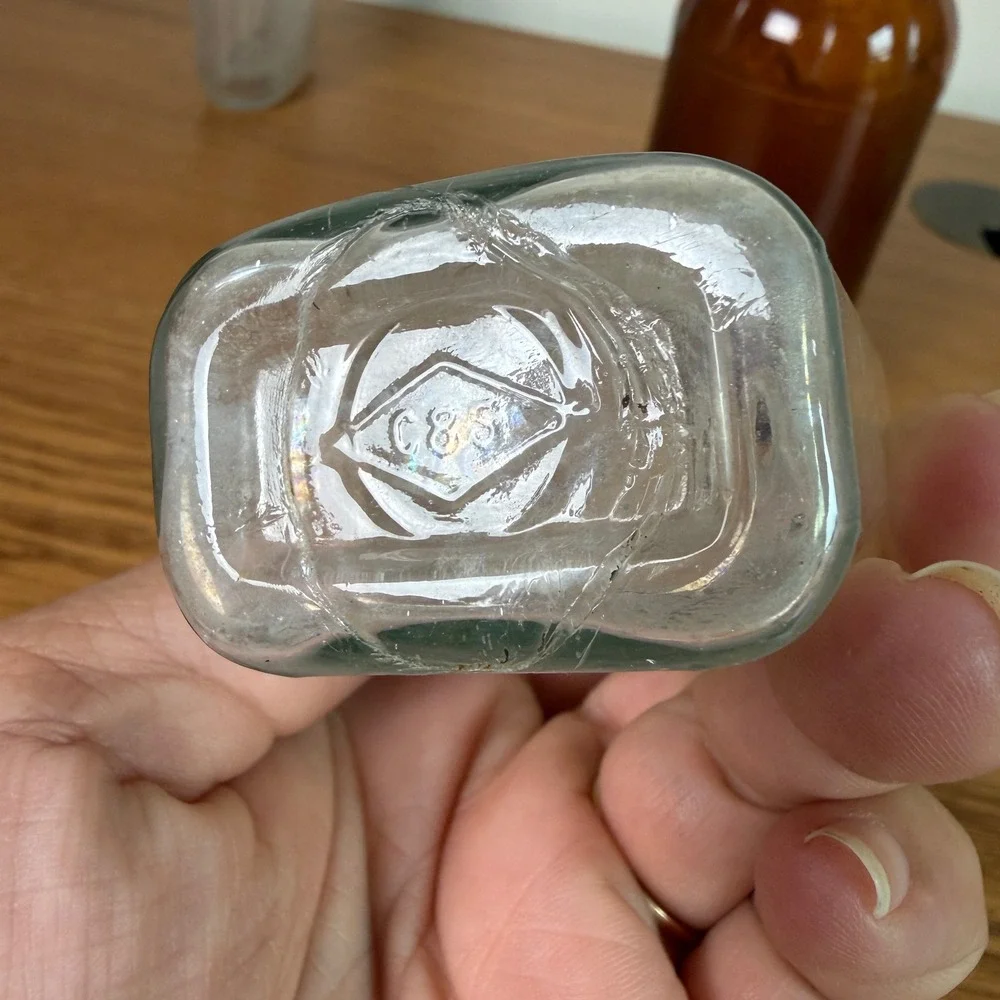Vintage Glass Bottle Trio Amber and Clear Apothecary Medicine Bottles Set of 3